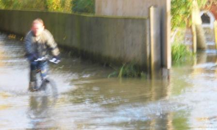 Cyclist in Flood Henley Mill Lane